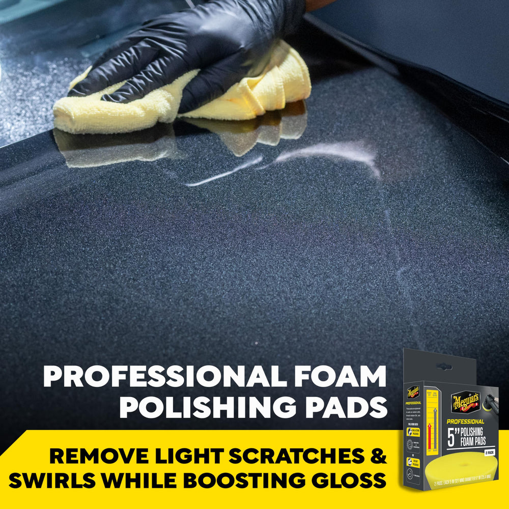 Meguiar's 5-inch polishing pad in use with rotary polisher to tackle defects.