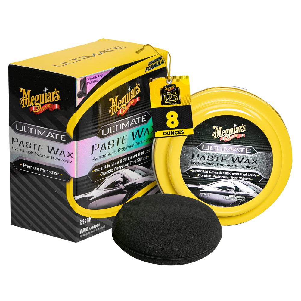 Meguiar's Ultimate Paste Wax bottle close-up for long-lasting clear coat protection.