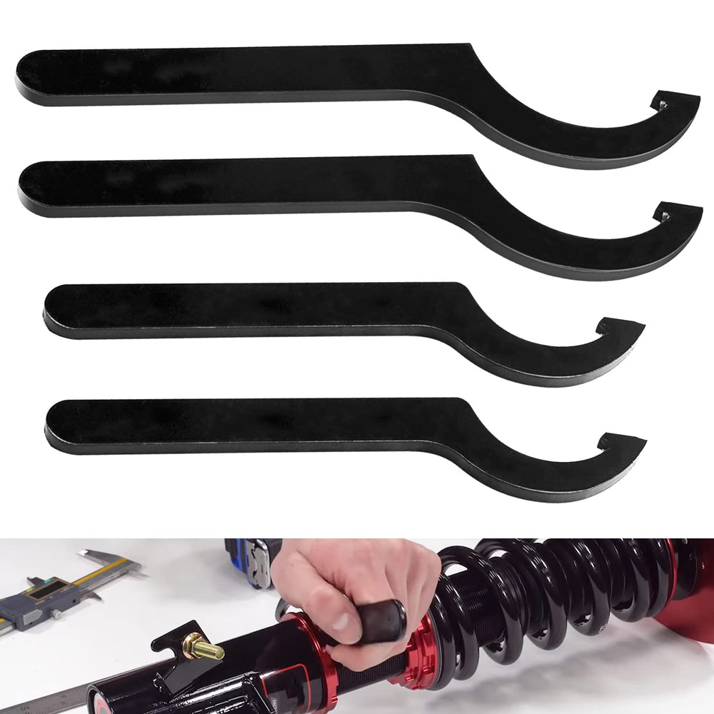 Mekar coilover adjustment tool with two large wrenches ready for quick suspension tweaks