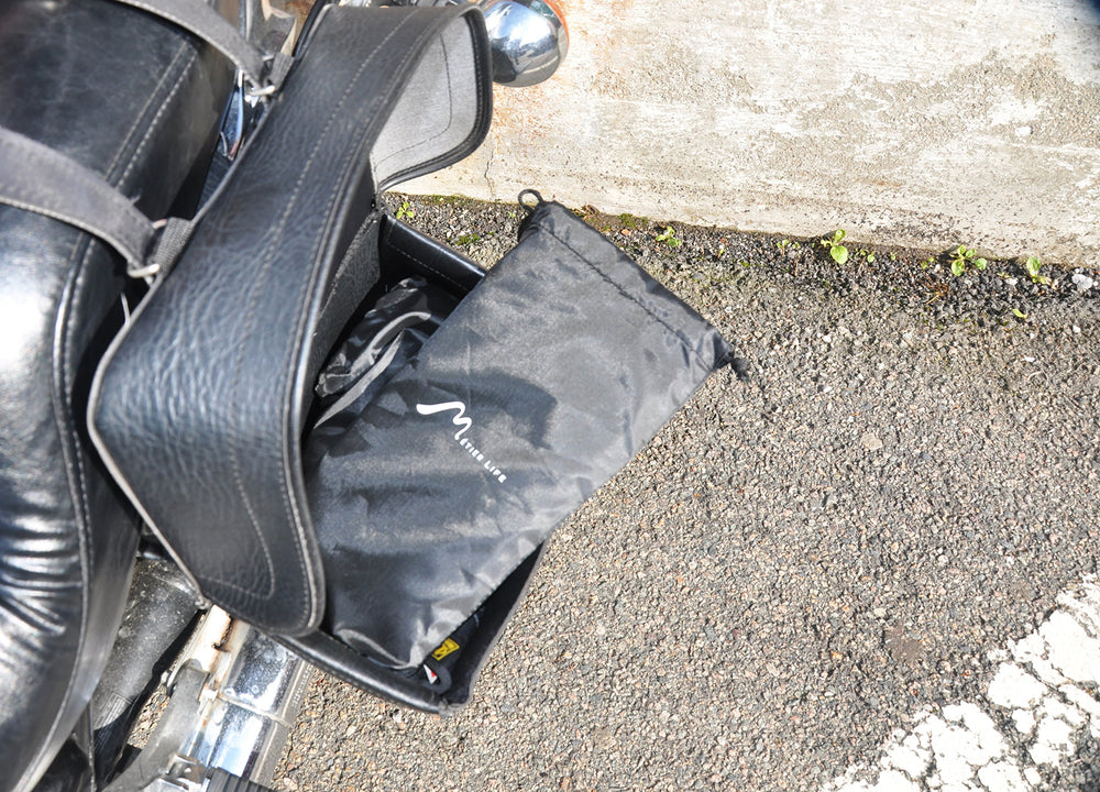 Metier Life compact drawstring bag stores the cover neatly for travel.