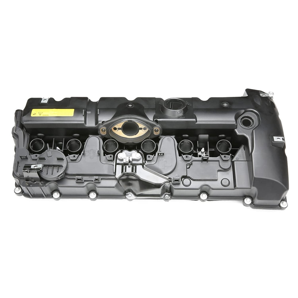 PCV valve integrated design aids proper hose routing during replacement