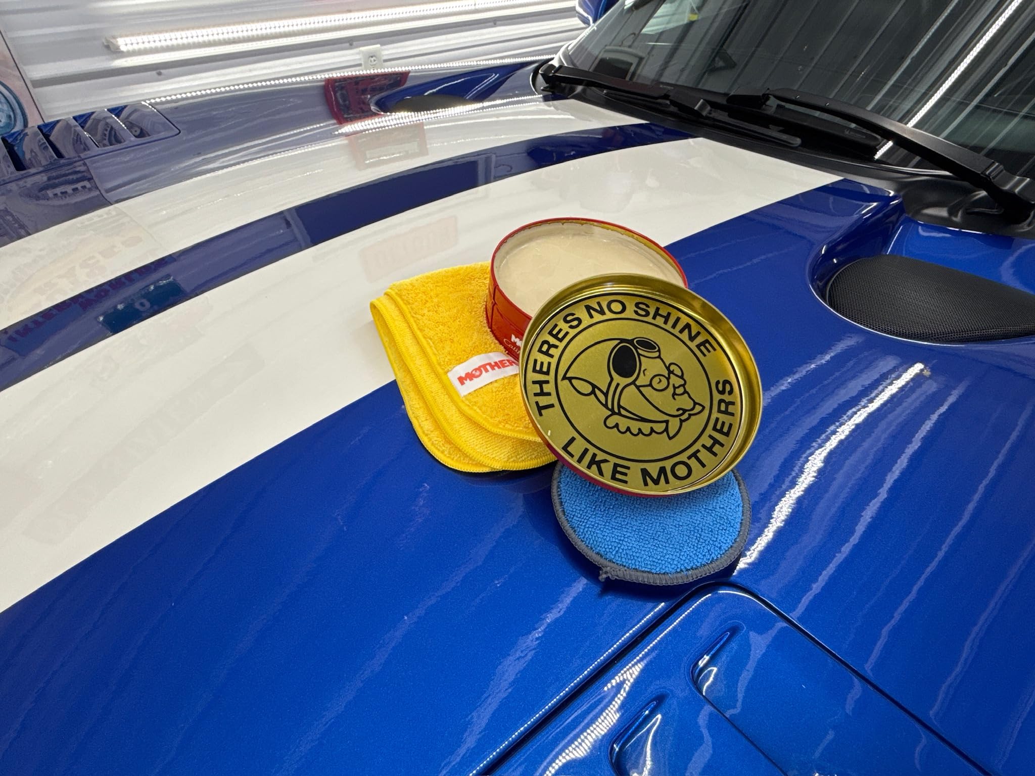 Mothers California Gold Step 3 locks in finish after surface prep.