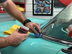 Mothers Mag Aluminum Polish on stainless steel trim highlights a clean, reflective surface.