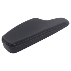 MOTOKU front driver door panel armrest close-up in black leather with improved grip and aesthetics.