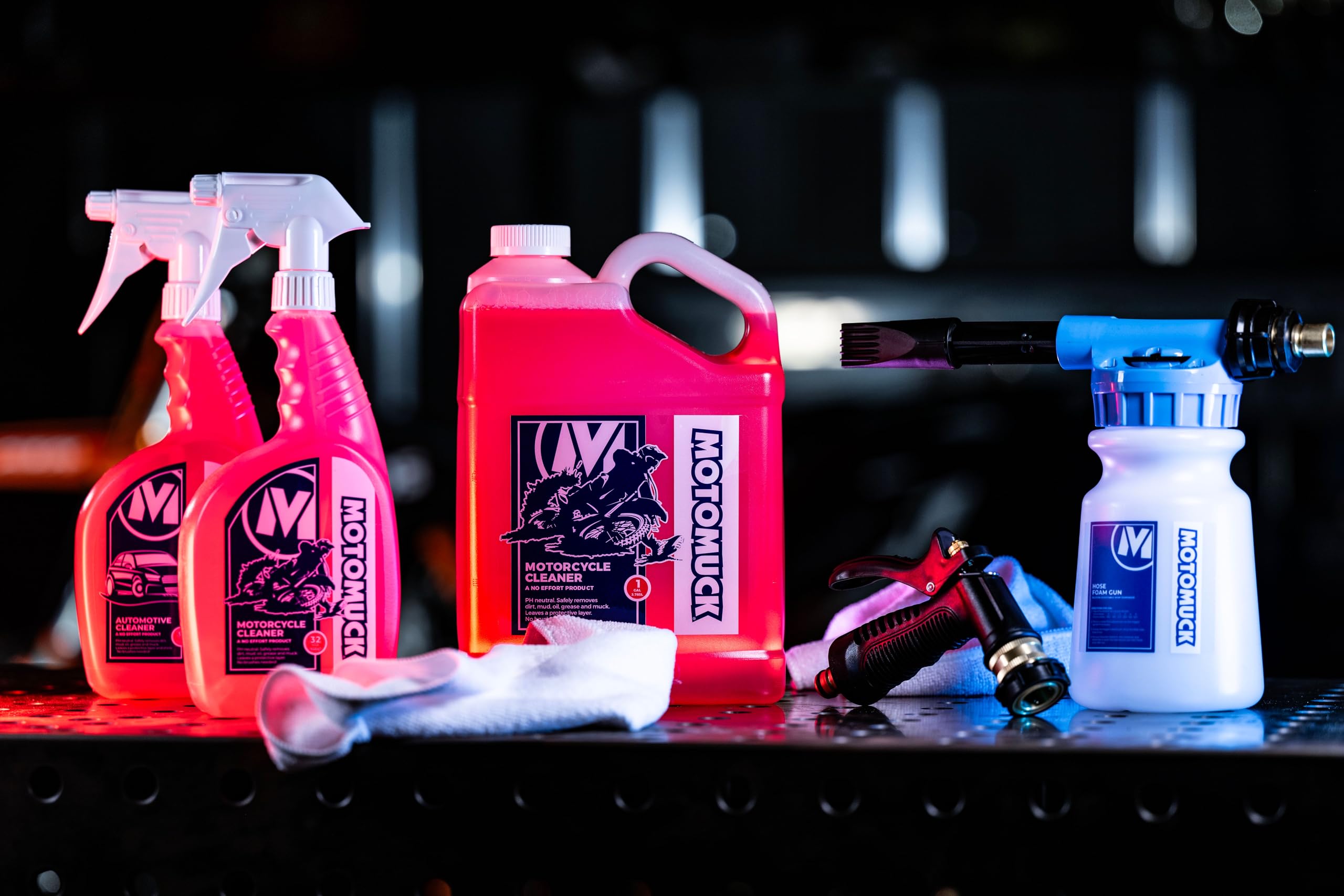 Motomuck PH Neutral cleaner used on a dirty bike frame for thorough, gentle cleansing
