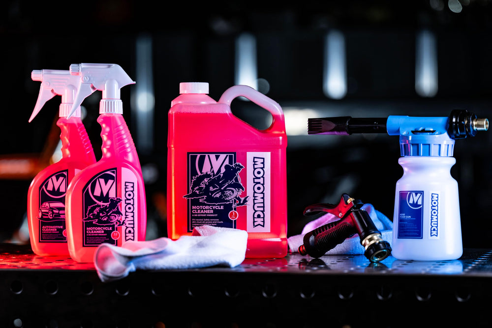 Motomuck PH Neutral cleaner used on a dirty bike frame for thorough, gentle cleansing