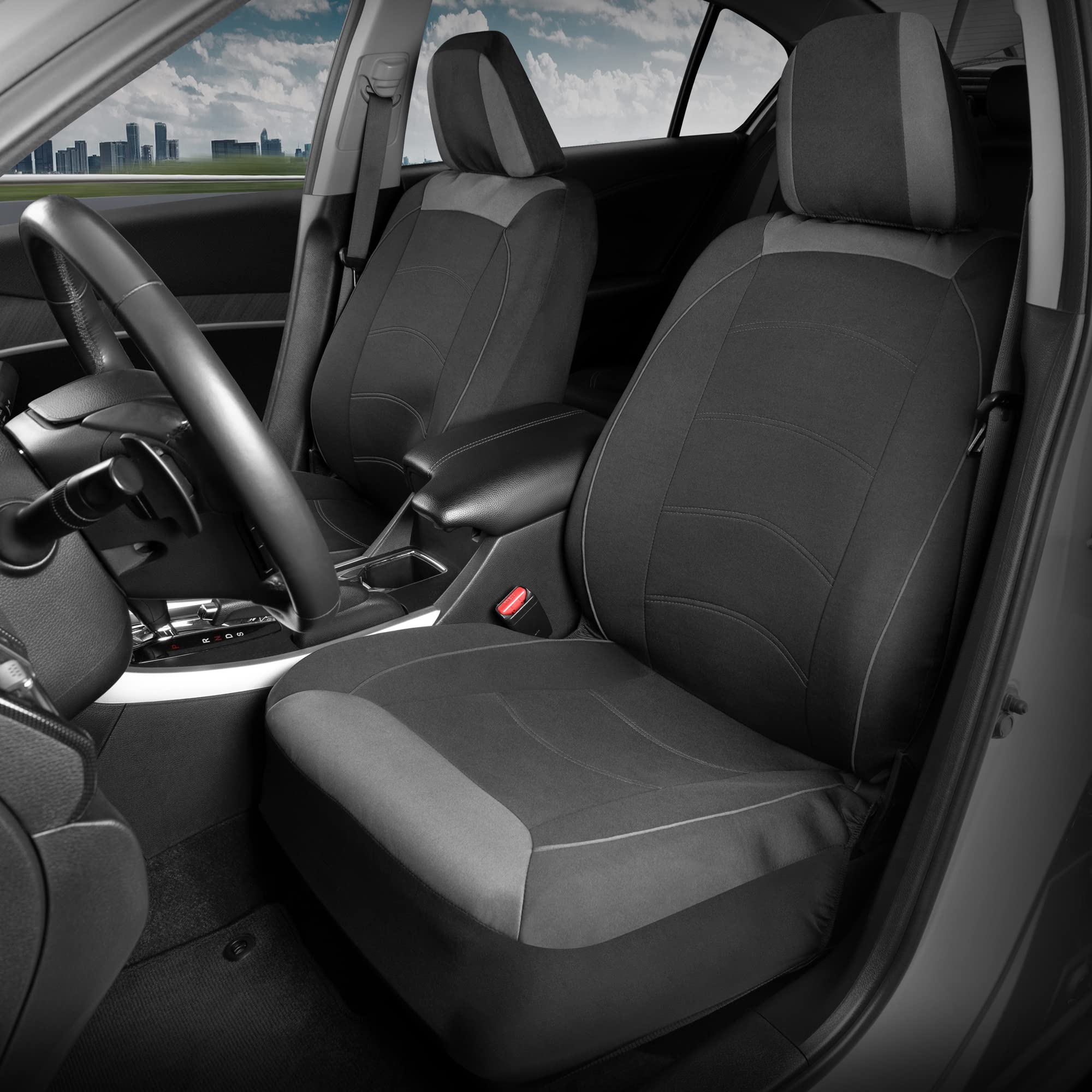 Close-up of Motor Trend cloth front seat fabric showing stitching and texture.