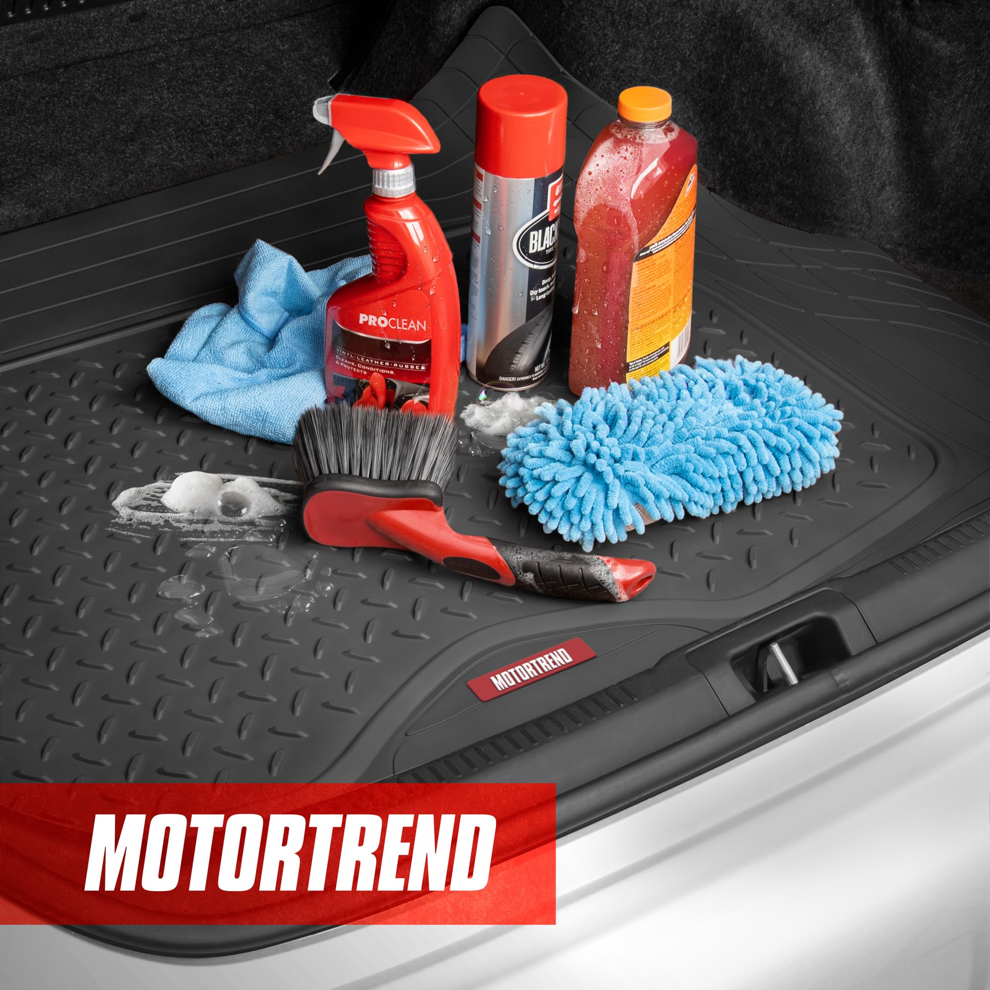 Motor Trend trim-to-fit floor mat adapts to vehicle floors with scissors