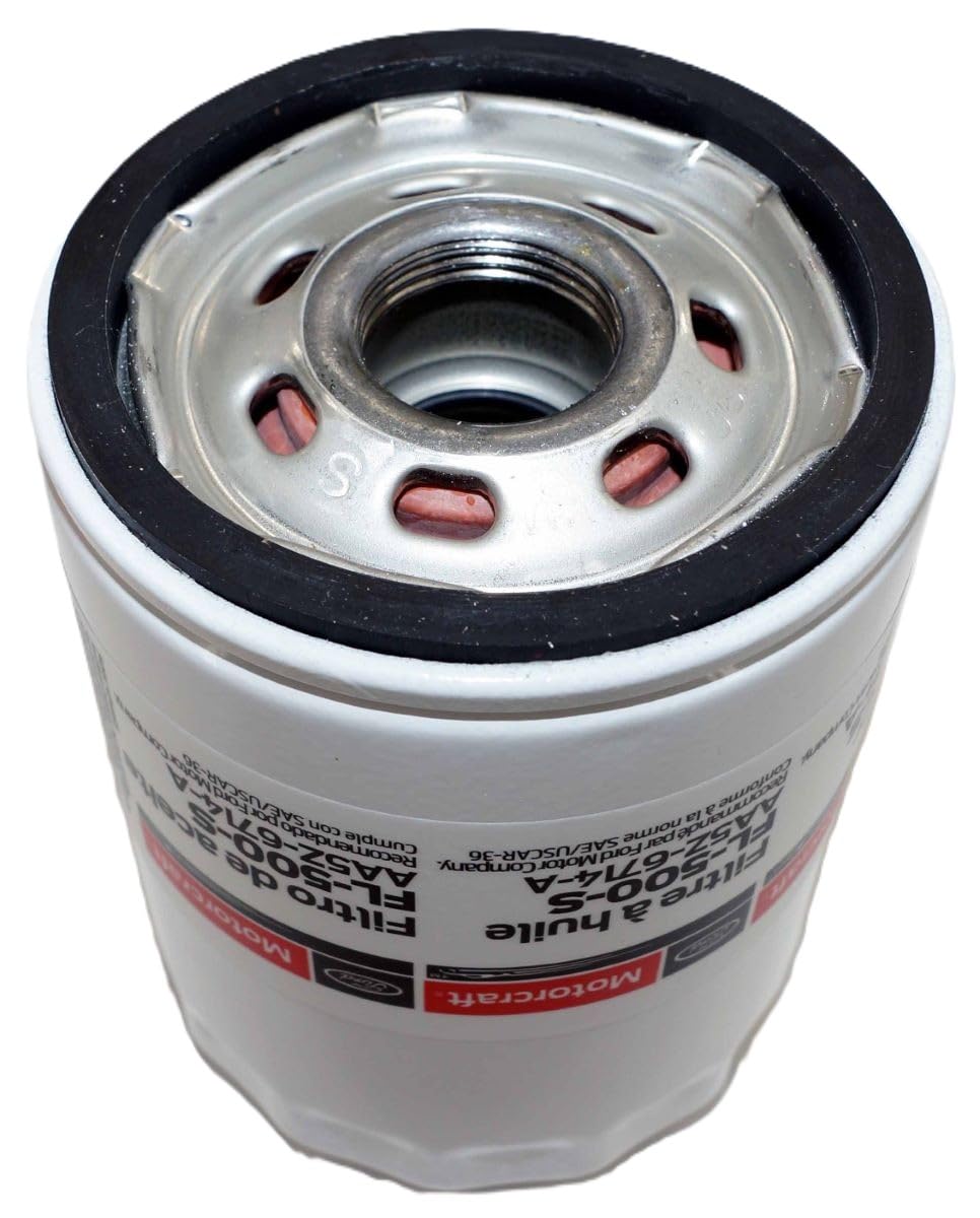 Motorcraft FL500S-12PK installation hand-held demonstrates easy replacement