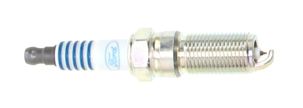 Motorcraft SP580X spark plug in engine bay ready for installation.