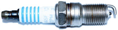 Motorcraft SP-493 spark plug in box highlights genuine OEM quality