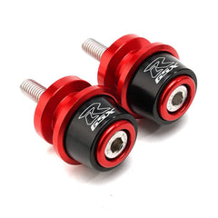 MOWOK swing arm spool red closeup showing precise fit for GSXR.