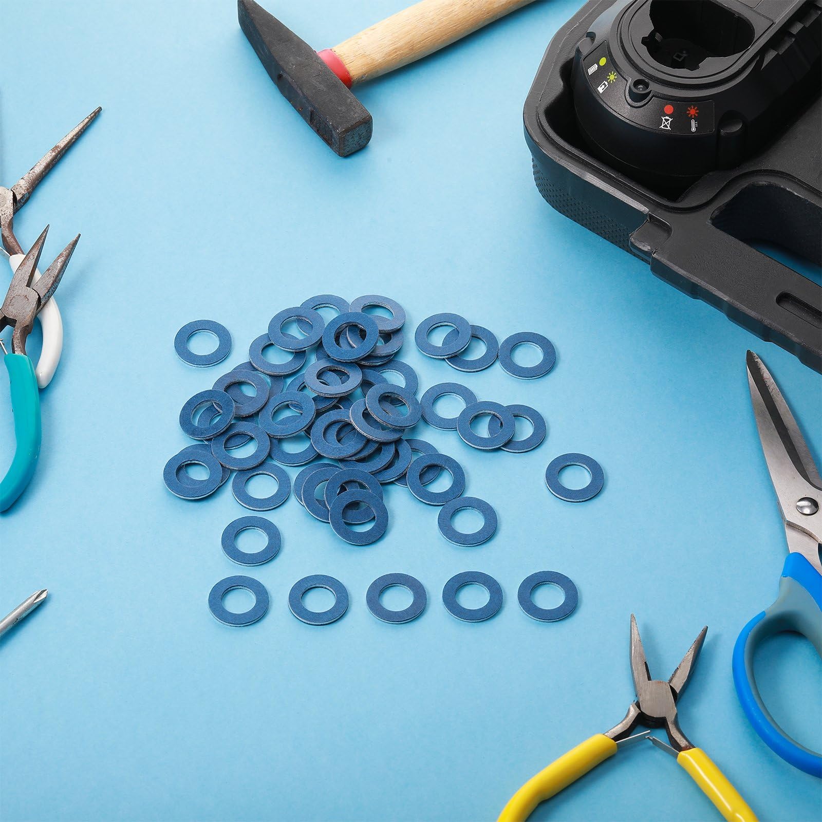 Mudder blue oil pan drain plug gasket providing a precise seal for fittings.