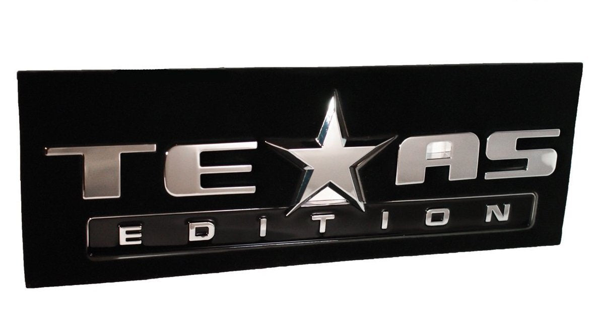 Muzzys Texas Edition emblem for Suburban adds rugged visual upgrade on doors.