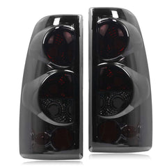 Nakuuly tail light for Chevy Silverado driver side with black smoked lens for improved visibility.