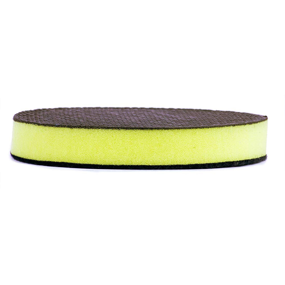 Nanoskin Autoscrub on car panel removes embedded contaminants for a smooth prep.
