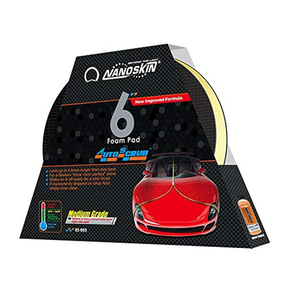 Nanoskin Autoscrub pad in hand for safe surface decontamination before waxing.