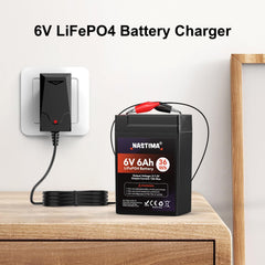 NASTIMA 6V LiFePO4 charger back view shows portable design.