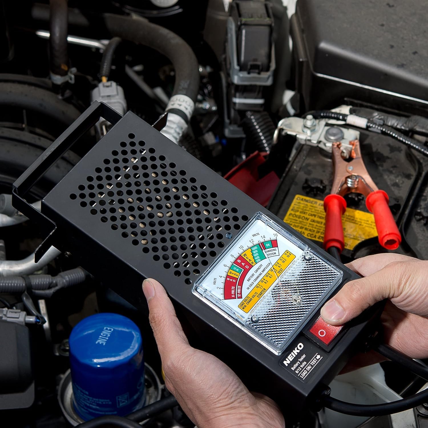 NEIKO 40510A portable battery tester fits in a tool bag for on-site diagnostics.