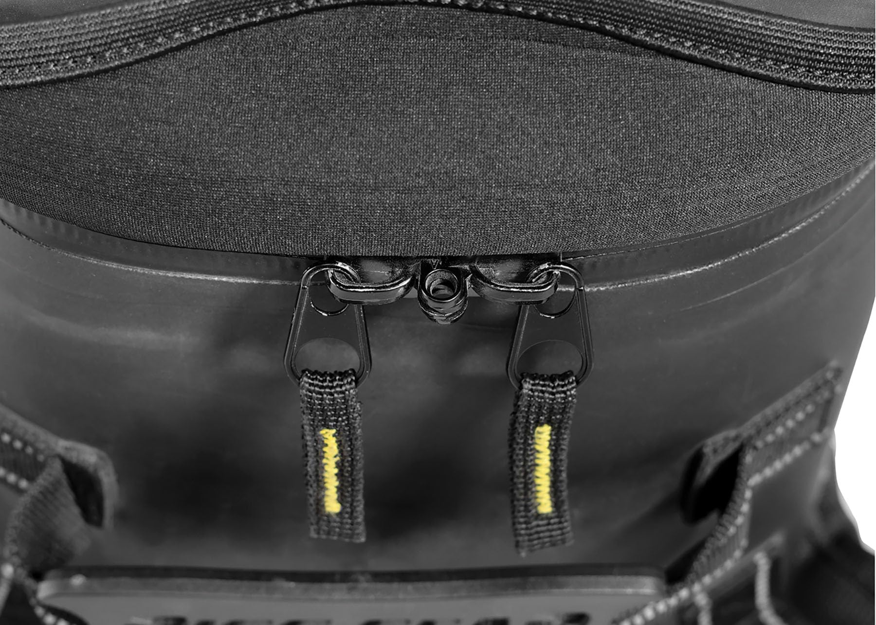 Nelson-Rigg waterproof flap shields zippers from dust and weather.