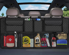 NEWFOM car trunk organizer with eight pockets stores tools neatly organized.