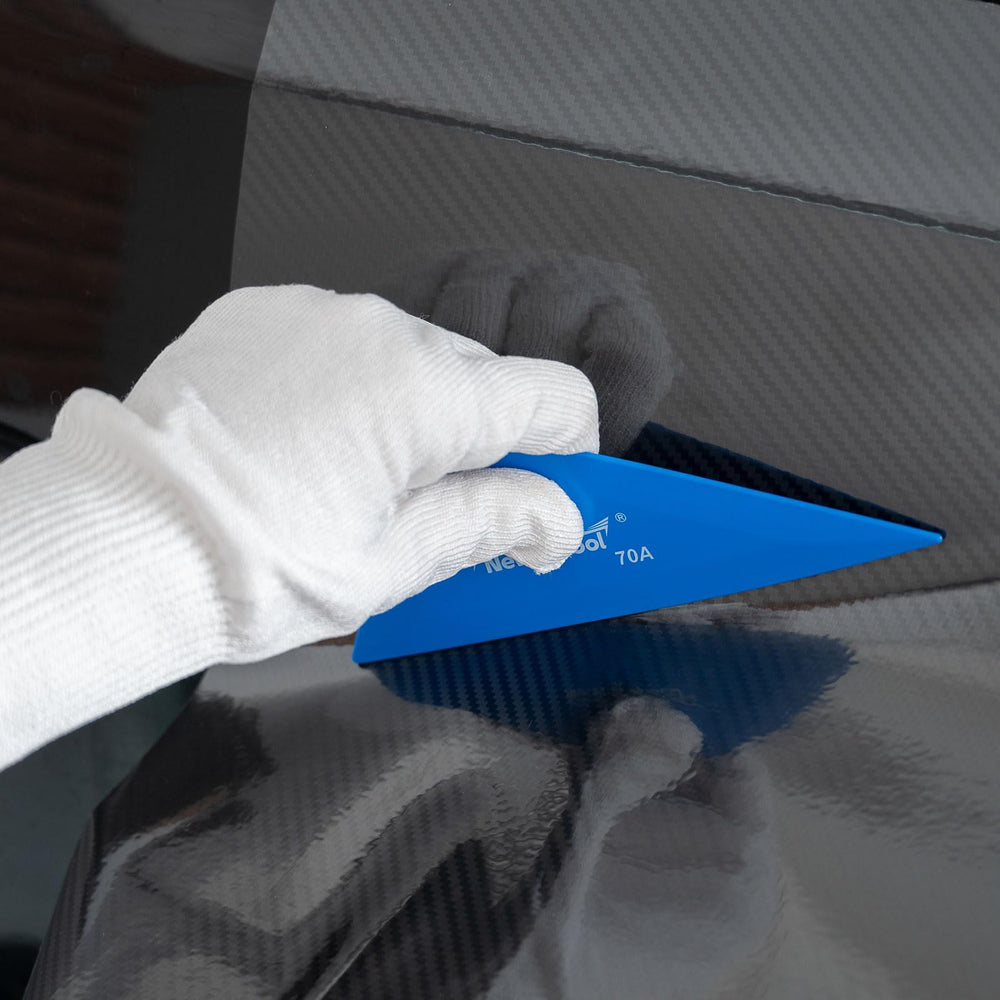 NEWISHTOOL vinyl scraper used between handles and panels for clean results