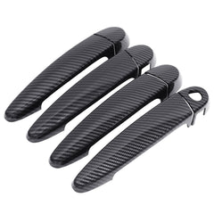 NewYall carbon fiber exterior door handle cover on the front right, adds premium finish.