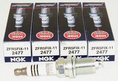NGK 2477 iridium spark plug closeup showcasing durable electrode design for longevity.