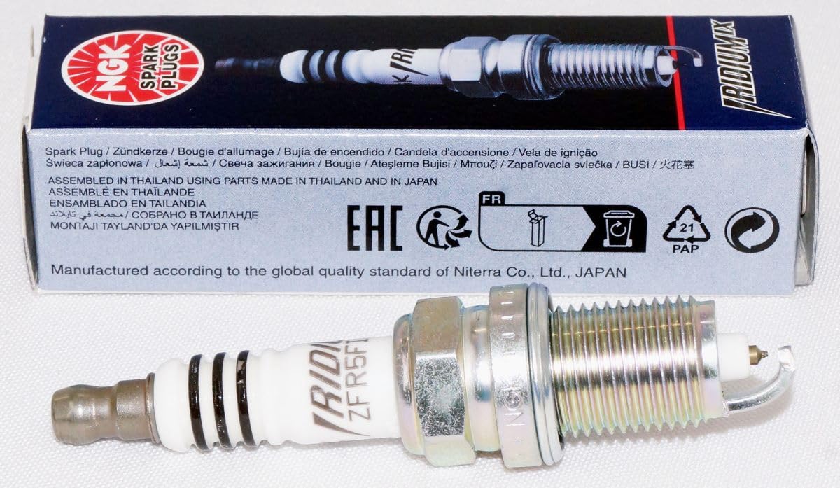 NGK 2477 spark plug four-pack packaging displayed for OEM compatibility.