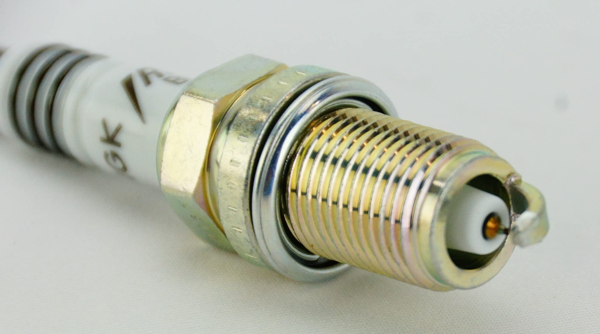 NGK Iridium IX spark plug corrosion plating detail indicating anti corrosion finish
