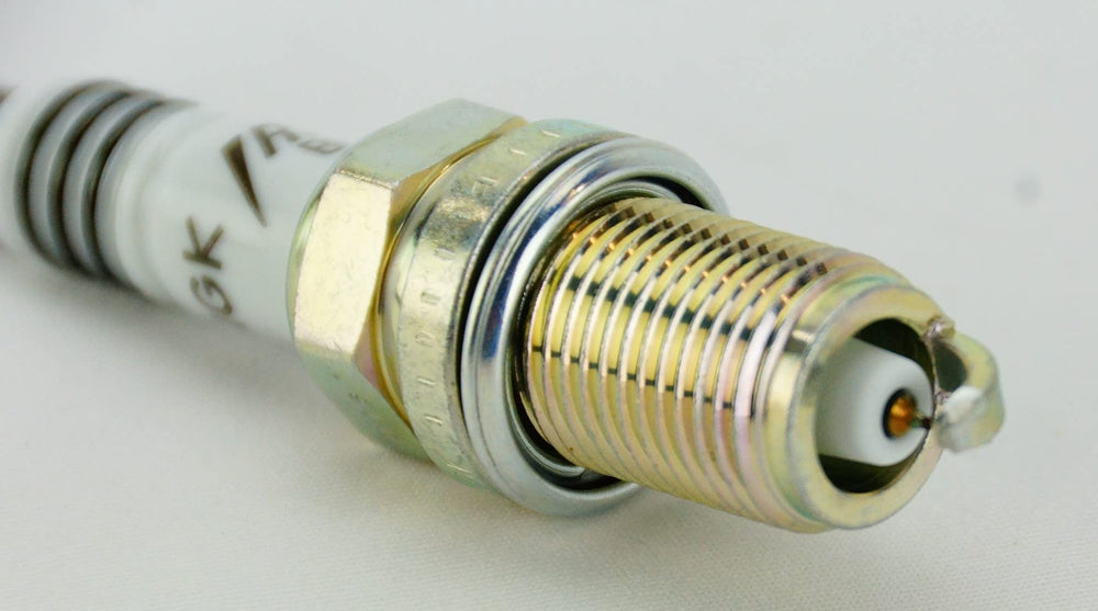 NGK Iridium IX spark plug corrosion plating detail indicating anti corrosion finish