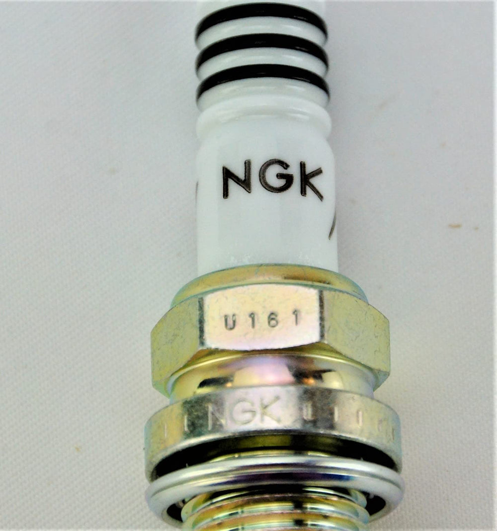 NGK Iridium IX spark plug insulator nose focusing on fouling resistance