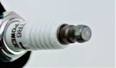 Close-up of NGK 4177 TR6 V-Power spark plug copper core detail