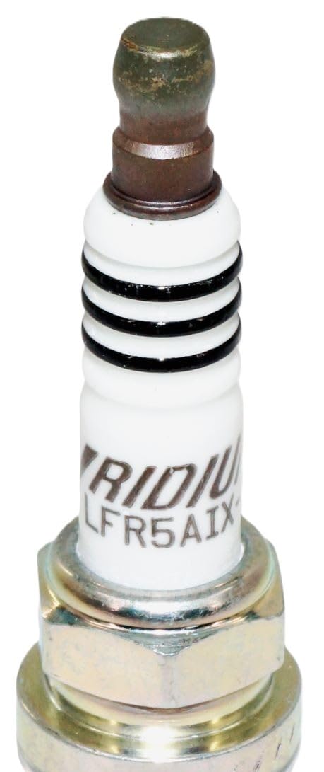 NGK 4469 Iridium IX spark plug closeup of fine electrodes and precise gap.