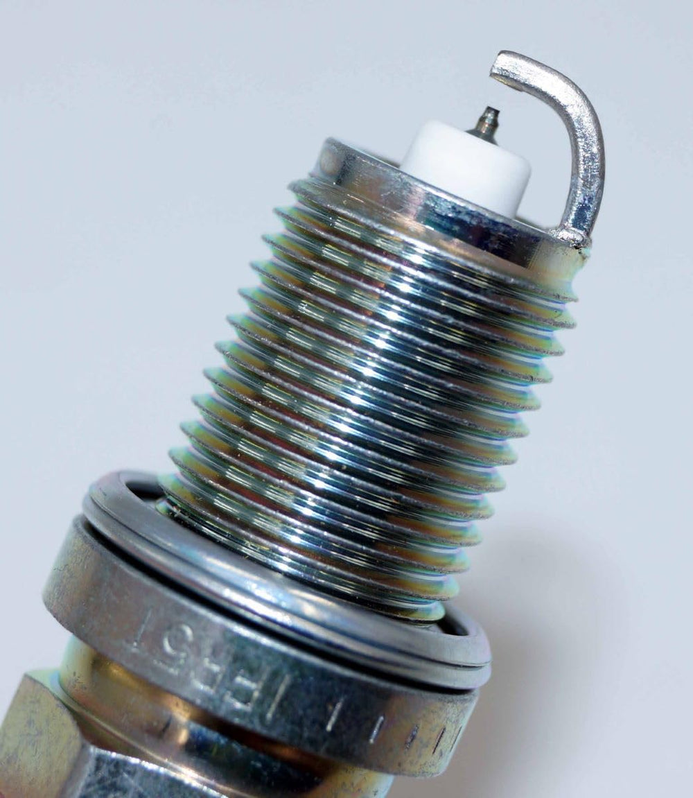 Packaging label for NGK 4996 four-pack spark plugs