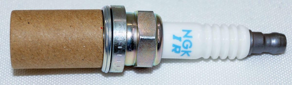 Spark plug tip close-up highlighting laser Iridium technology
