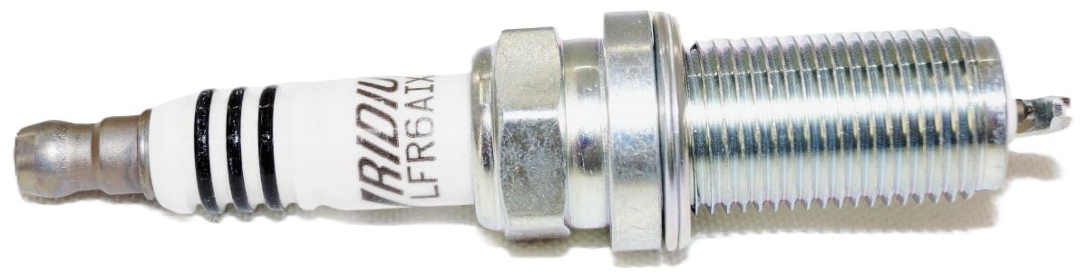 NGK 6619 iridium spark plugs installed in packaging for maintenance readiness.