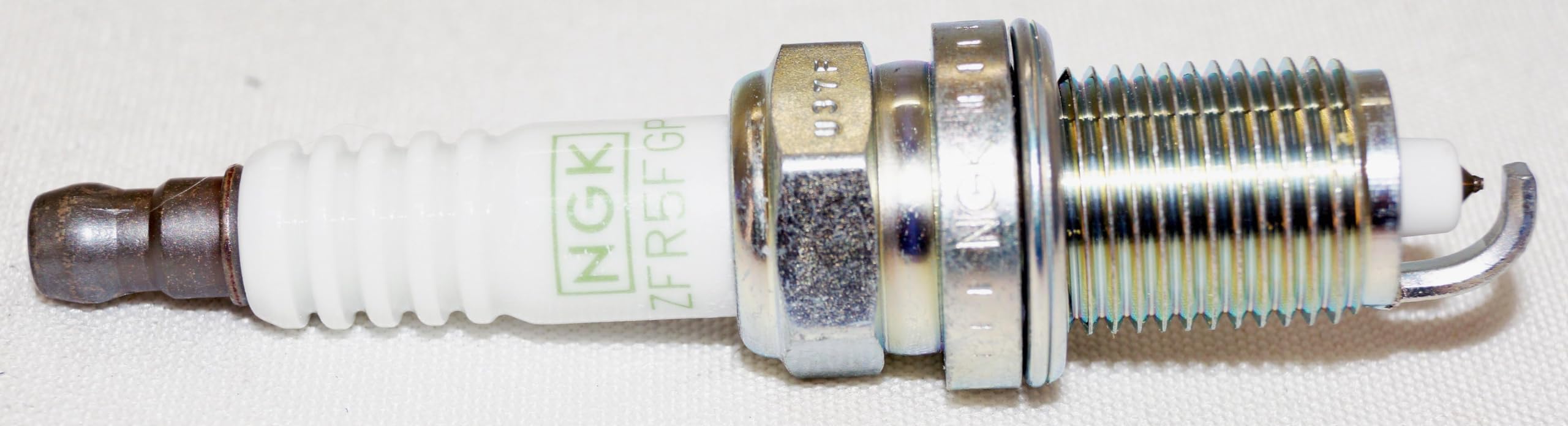 NGK 7098 G-Power spark plug electrode detail reveals platinum alloy design