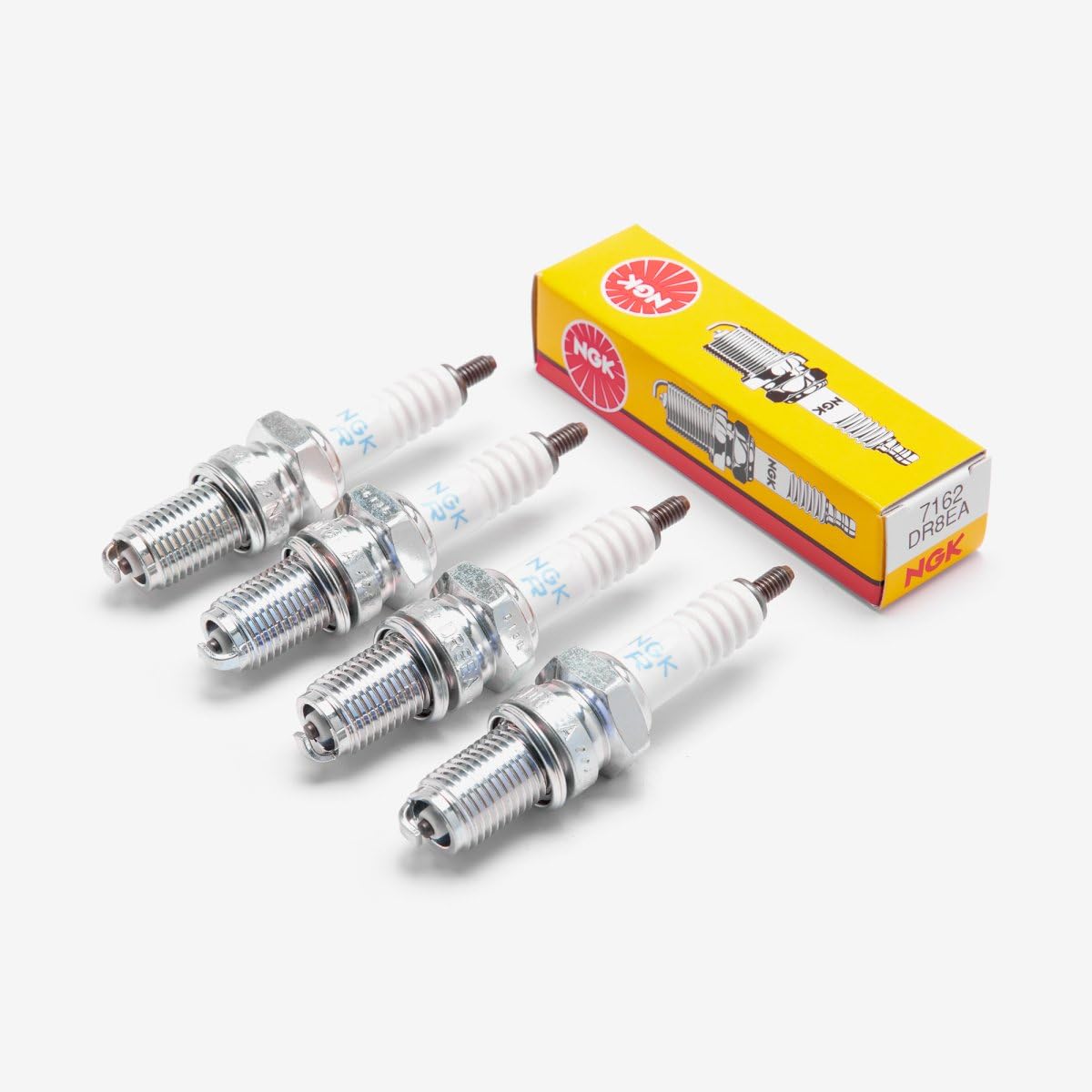 NGK 7162 spark plug packaging, genuine part ready for replacement.