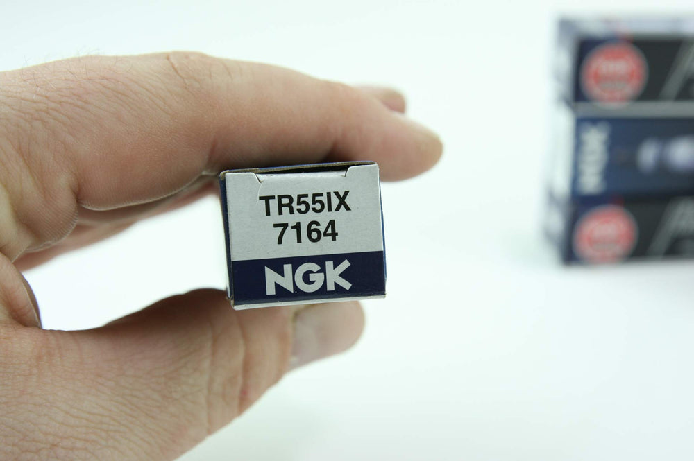 NGK 7164 Iridium IX spark plugs installed in engine bay