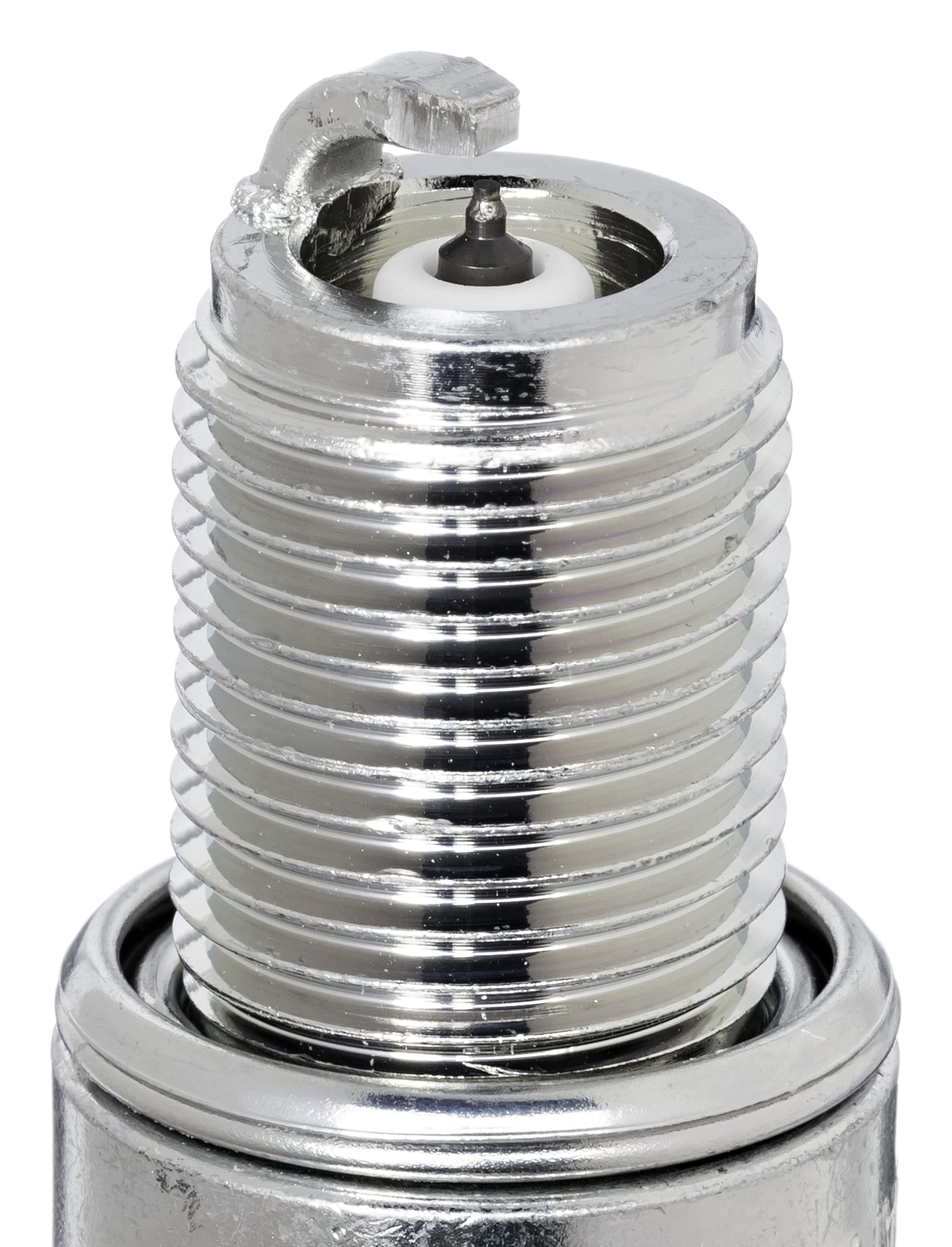 NGK BR7EIX tapered ground electrode seen for reduced electrical quenching.