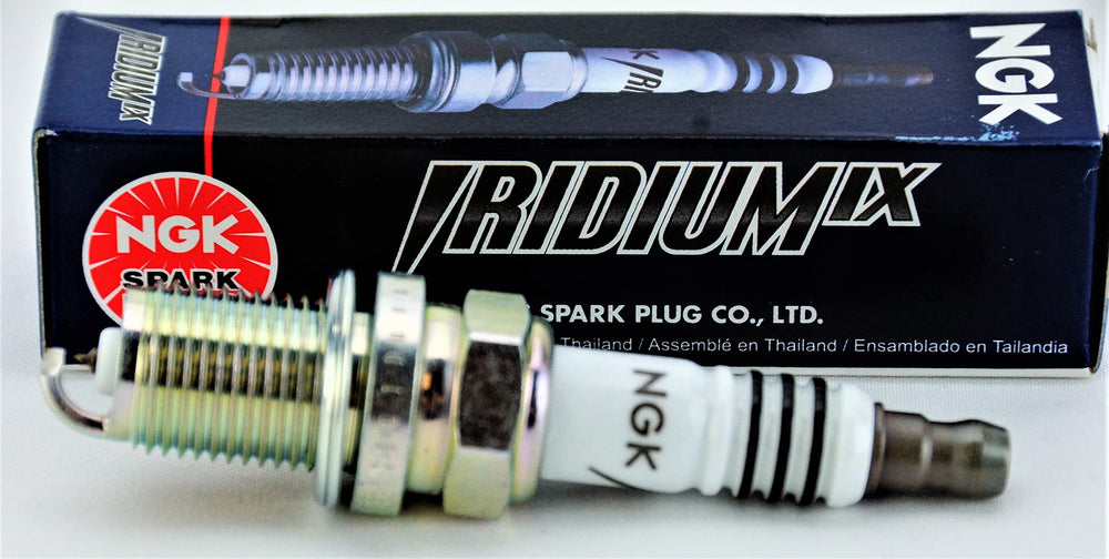 NGK brand image featuring four new spark plugs for installation readiness.
