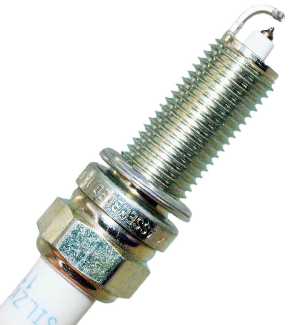 NGK ceramic insulator detail with robust insulation material.