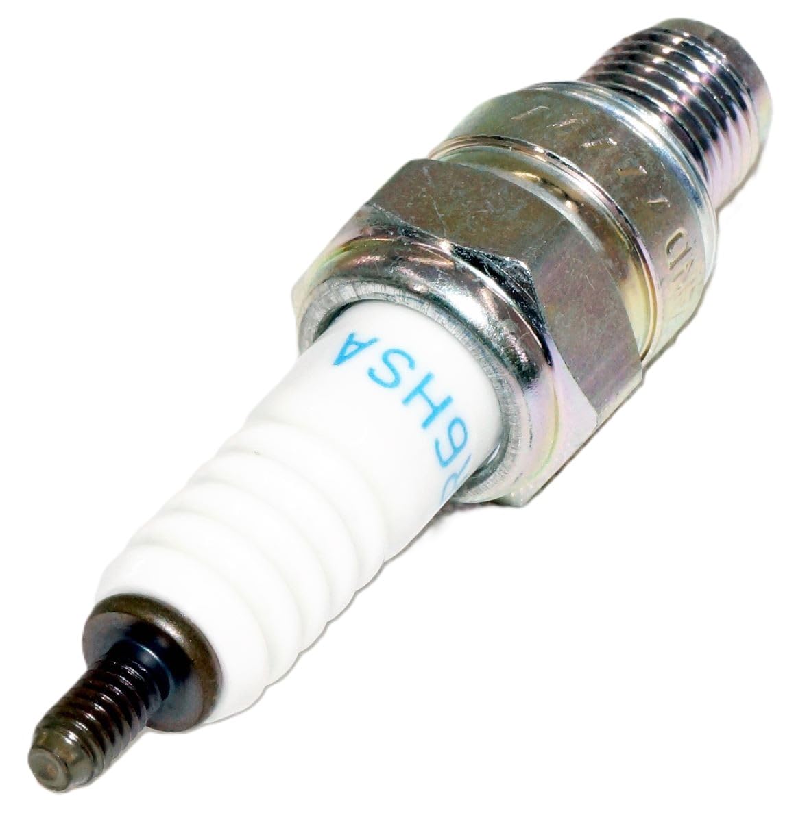 NGK CR6HSA spark plug mounted in engine bay for quick starts.