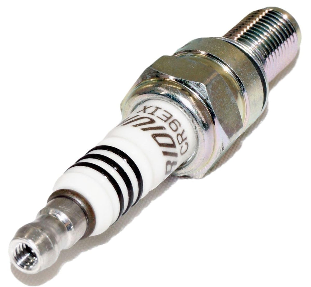 NGK Iridium IX spark plug on production line indicating quality control