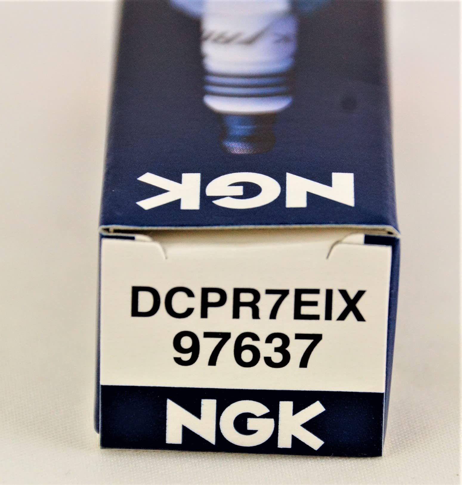 Harley-Davidson engine view with NGK spark plug installed