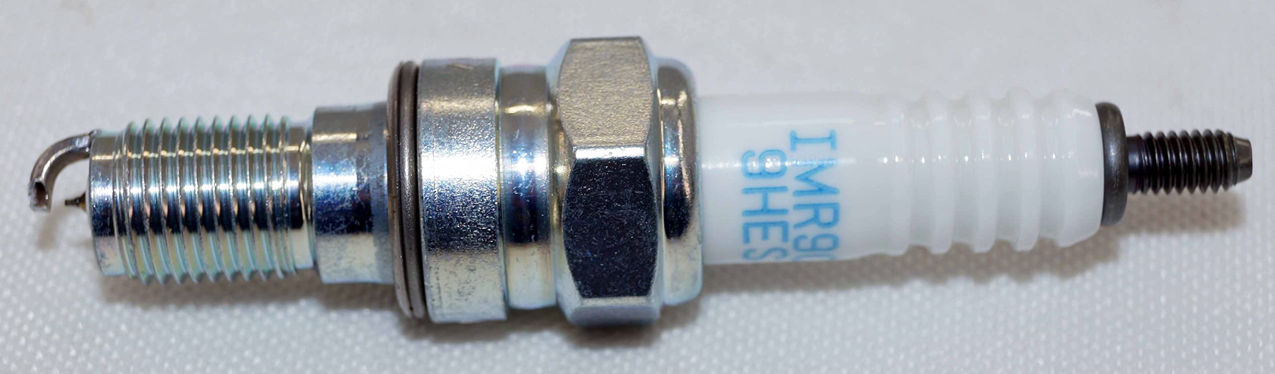 NGK IMR9C-9HES four-pack ready for replacement