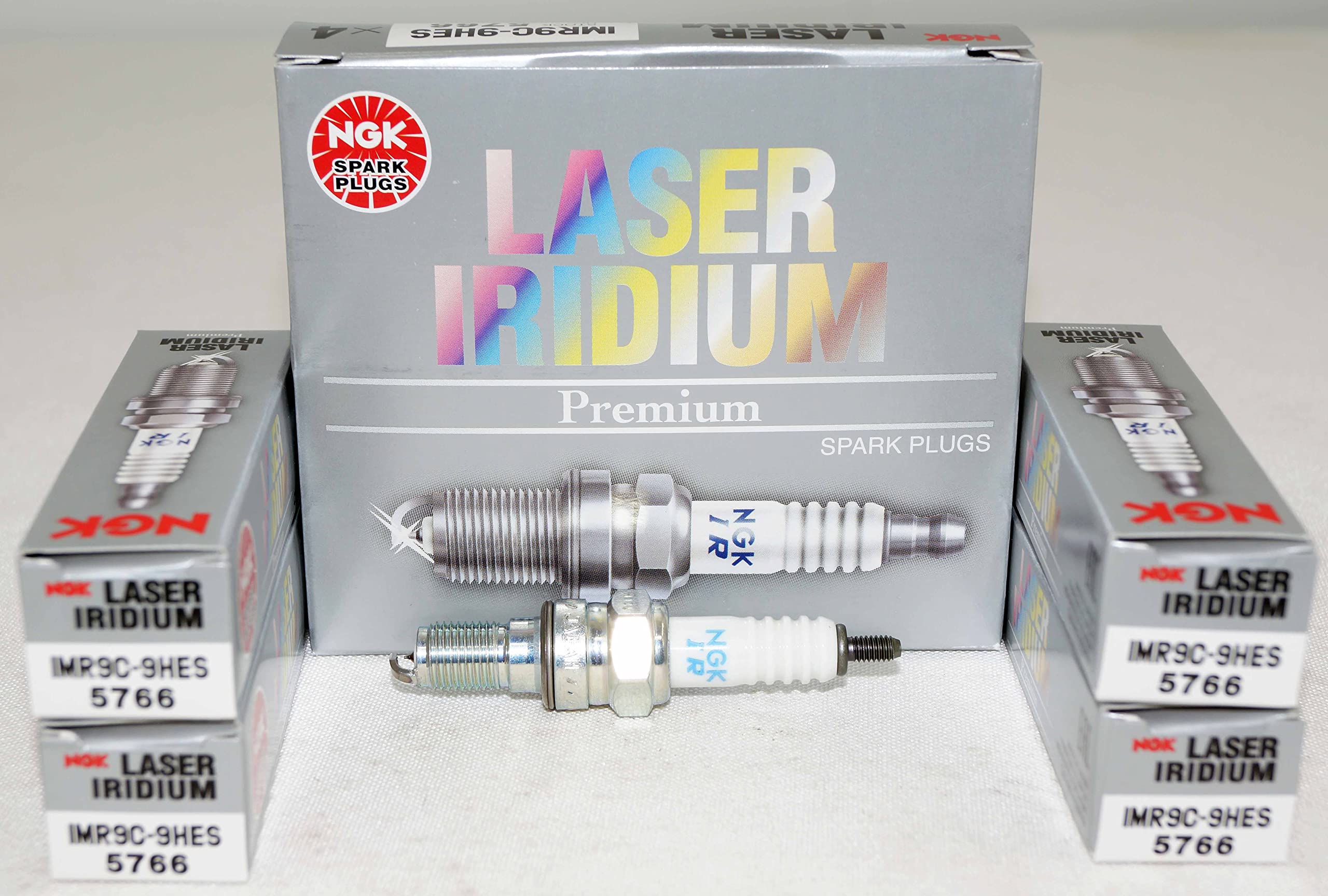 NGK IMR9C-9HES spark plug close-up showing laser iridium tip for durability