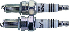 NGK Iridium IX 4218 spark plug close-up for reliable ignition and smooth engine performance.