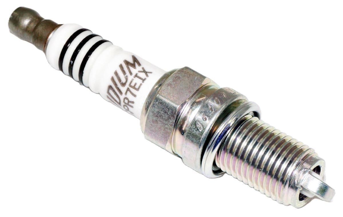 NGK Iridium IX plugs being installed on a Harley Twin Cam engine